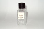 Photo © -  Lotion Douce 19 ml vide bouchon siglé en creux blanc de Chanel prix = 3 €