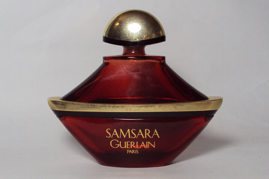 Samsara Flacon du parfum Factice vide Hauteur 8.7 cm trace de colle a l'arrière de Guerlain 